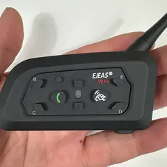 Complete setup of the EJEAS V6 Pro+ Bluetooth headset installed on a motorcycle