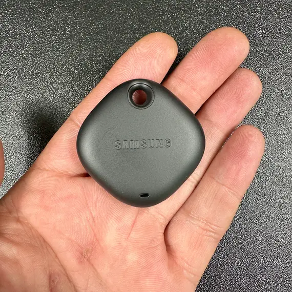 Person using smartphone to locate Galaxy SmartTag