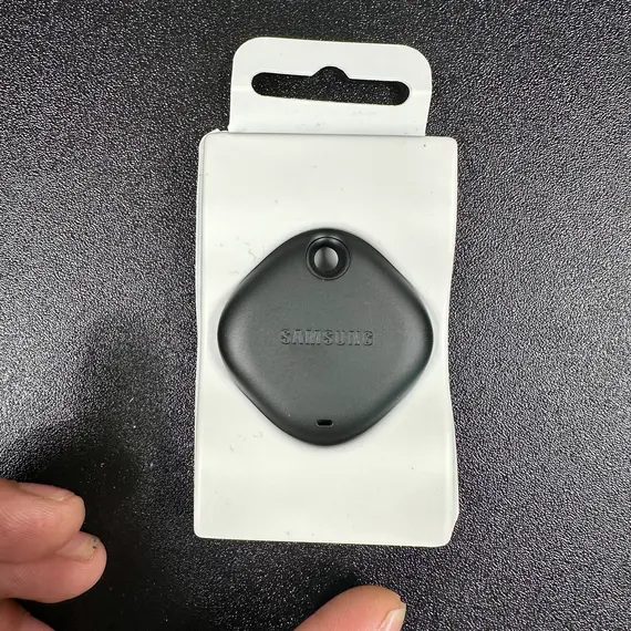 Person using smartphone to locate Galaxy SmartTag